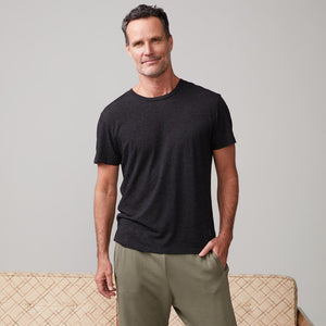 Front view of model wearing the textured tri-blend relaxed crew in black.